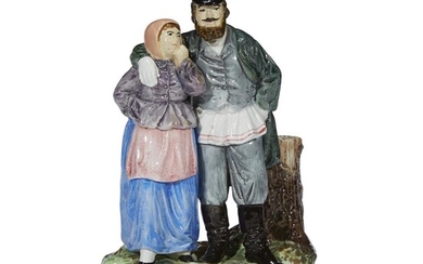 A Russian porcelain group "Peasant Couple" M.S. Kuznetsov Manufactory,...