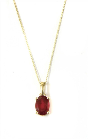 A gold treated ruby pendant