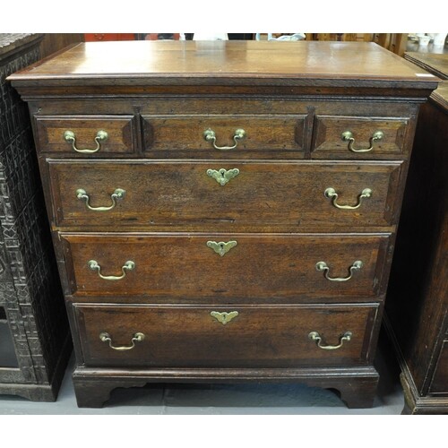 19th Century oak straight front chest of drawers, the moulde...