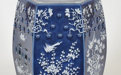 19th century Chinese pate-sur-pate hexagonal white over blue porcelain garden seat. Floral with bird