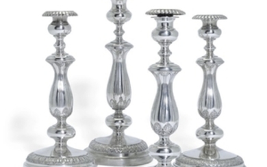 A composite set of four German silver candlesticks, three, Sy & Wagner, Berlin, 1863-69