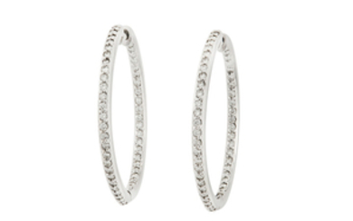A pair of diamond hoop earrings Each set...
