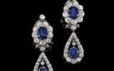 A pair of diamond and sapphire ear pendants