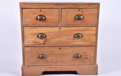 An early 20th century pine small chest with two short over two long drawers, the brass handles bearing the 'GR' (George...
