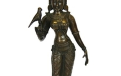 A mid 20th Century Northern Indian bronze figure of Meenakshi holding a bird, H. 28cm.