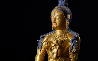 A rare gilt-bronze figure of White Tara