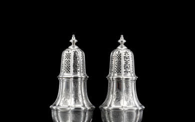 A pair of silver sugar-casters. France, 18th Century (h. cm 22) (g 1030 ca.)