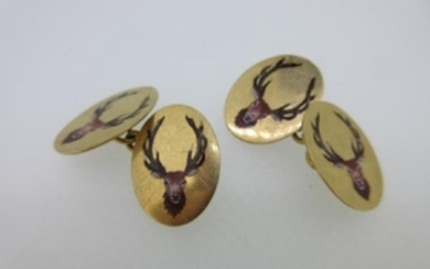A pair of stag's head 18ct gold and enamel cufflinks