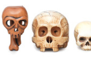 Two wood netsuke and three ivory skulls