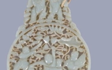 A Chinese celadon jade plaque, the centre carved with a