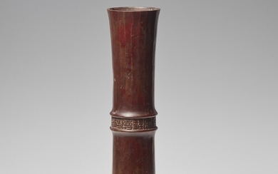 A tall and slender bronze vase. Ca. 1960/1970