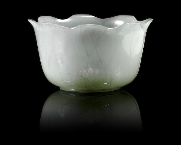 A pale green jade 'lotus leaf' cup