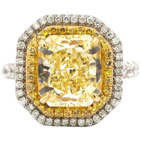 GIA Certified 5.26 Carat Fancy Yellow Diamond Ring