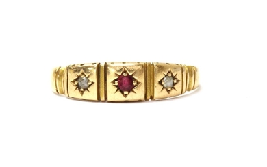 A 15ct gold ruby and diamond three stone ring