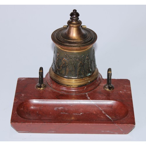 A 19th century French gilt and dark patinated inkwell, hinge...