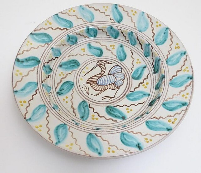 A 20thC Scandinavian hand painted plate / charger, the