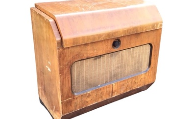 A 50s walnut cased Ferguson radiogram, the sloped lid to...