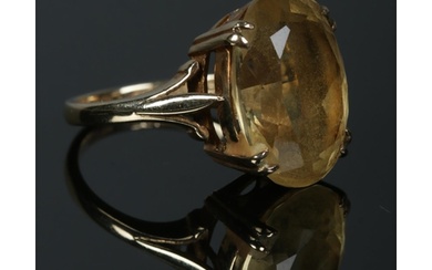 A 9ct Gold dress ring, set with large citrine coloured stone...