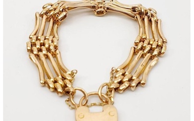 A 9ct gold four bar gate bracelet, A/F, weight 14.7g, length...