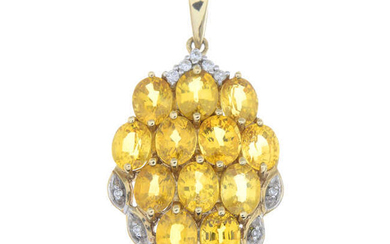 A 9ct gold yellow sapphire and single-cut diamond pendant.
