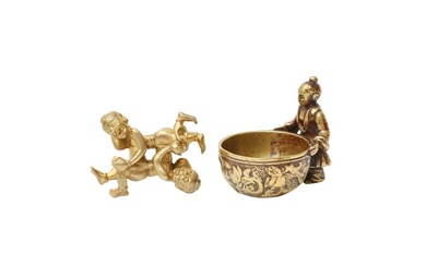A CHINESE GILT-BRONZE SCROLL WEIGHT AND A POLISHED-BRONZE CUP 清 銅鎏金鎮紙及銅盃