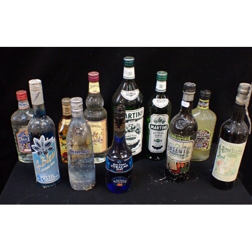 A COLLECTION OF TEQUILA AND OTHER SPIRITS including Martini,...