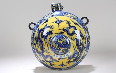 A Chinese Yellow-coding Duo-handled Detailed Dragon-decorating Porcelain Fortune Vase