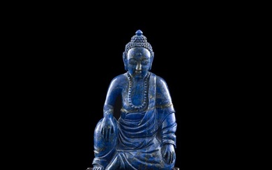 A Chinese carved lapis Buddha figure, 18th century