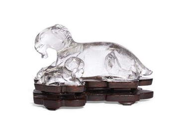 A Chinese rock crystal 'rams' figure group, early 20th century, carved as a recumbent ram and lamb, the fitted wood stand decorated with inlaid auspicious emblems, 20cm long, with fitted box 二十世紀早期 水晶臥羊擺件