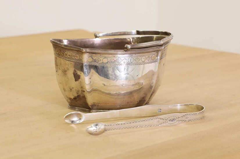 A George III silver swing-handled sugar basket