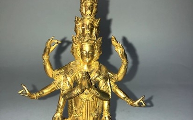 A Gilt Bronze Figure of Avalokiteshvara.