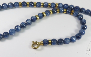 A KYANITE AND GOLD NECKLACE