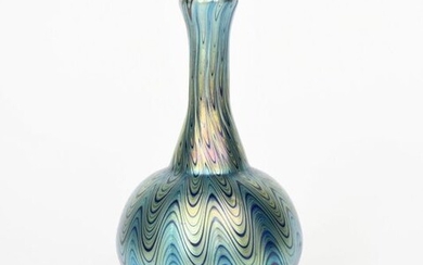 A Loetz glass vase, ovoid with waisted cylindrical neck, covered in a combed iridescence, unsigned, 20cm. high