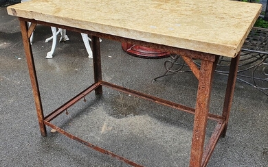 A MARBLE TOP AND WROUGHT IRON TABLE