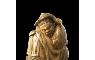 A Ming style ivory figure of a wise man China, Canton, late 19th century (h. 8.4 cm.) This lot...