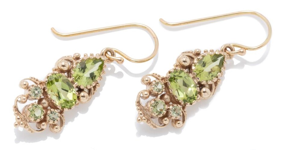A PAIR OF 9CT VICTORIAN STYLE PERIDOT EARRINGS; each a cannetille style drop set with an oval, pear and round cut peridot, length 28...