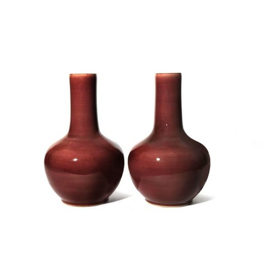 A PAIR OF CHINESE COPPER-RED GLAZED BOTTLE VASES...