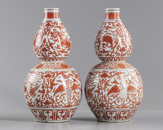 A PAIR OF CHINESE IRON-RED DOUBLE GOURD VASES