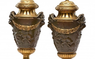 A PAIR OF LOUIS XV STYLE GILT AND PATINATED BRONZE URNS