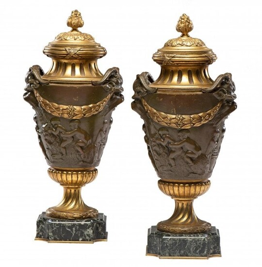 A PAIR OF LOUIS XV STYLE GILT AND PATINATED BRONZE URNS