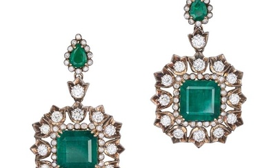 A PAIR OF ZAMBIAN EMERALD AND DIAMOND DROP EARRINGS each set with a pear cut emerald in a border ...