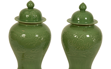 A Pair of Celadon Glazed Covered Jars