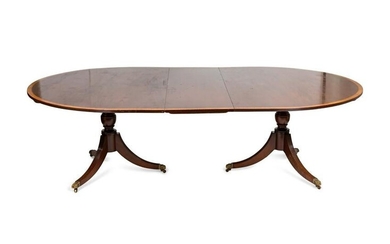 A Regency Style Satinwood Banded Mahogany Dining Table