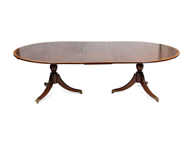A Regency Style Satinwood Banded Mahogany Dining Table