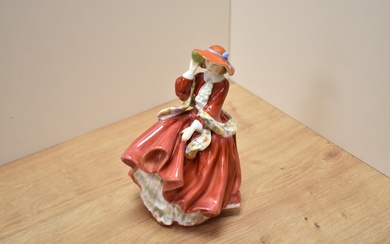 A Royal Doulton bone china figurine Top o'the Hill figurine, HN1834, windswept female in red dress