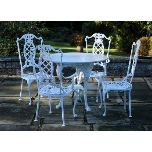A SET OF FOUR COALBROOKDALE STYLE PAINTED CAST-IRON GARDEN C...