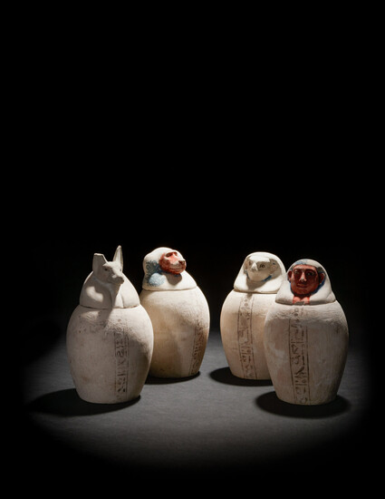 A Set of Four Egyptian Painted Limestone Canopic Jars of the Sons of Horus