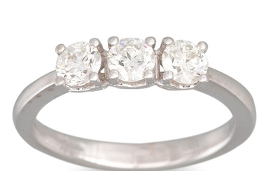 A THREE STONE DIAMOND RING, mounted in 18ct white gold. Esti...