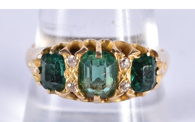 A VICTORIAN 18CT GOLD EMERALD AND DIAMOND RING. R. 4.3 grams...