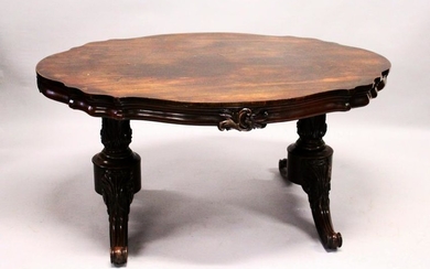 A VICTORIAN ROSEWOOD LIBRARY TABLE, with a shaped top